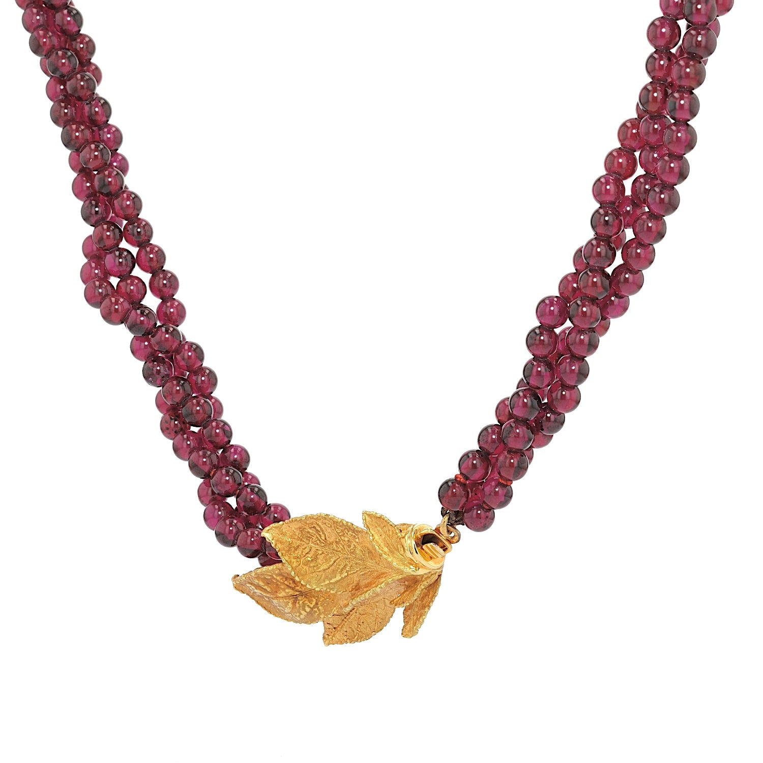 Ehinger Schwarz Collier aus Rhodolith Kugeln und einem Schloss aus 750er Gelbgold, hängend links gedreht