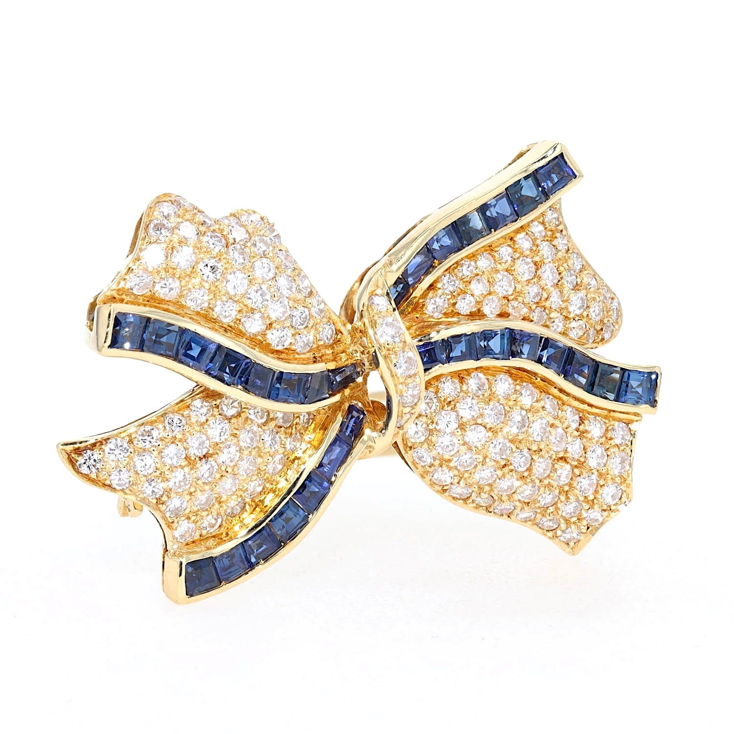 Brosche in 750er Gelbgold mit insgesamt ca. 1 ct Brillanten und blauen Saphiren, stehend rechts gedreht