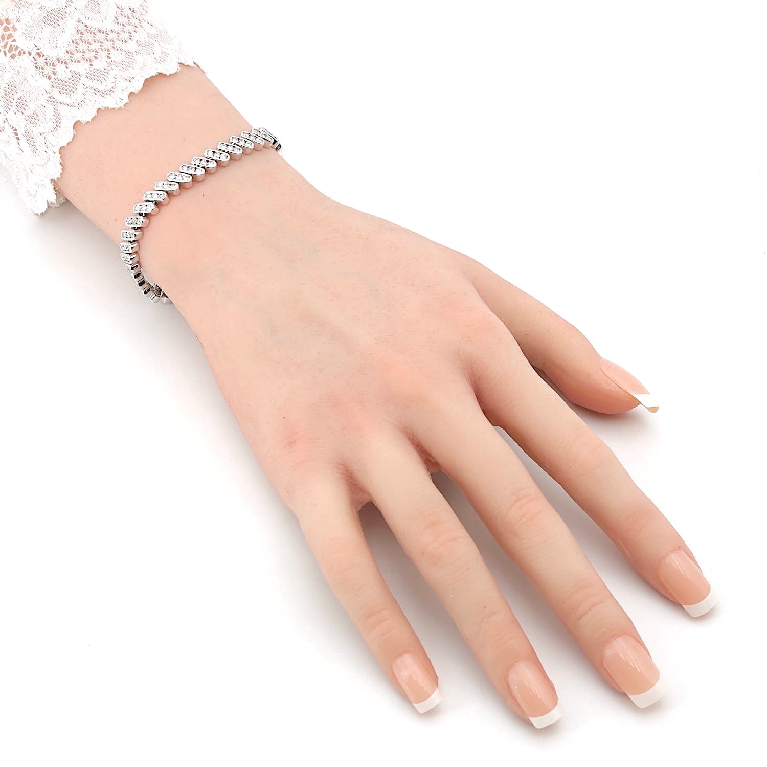 Tennisarmband in 585er Weißgold mit ca. 2,5 ct Brillanten, an einem künstlichen Arm