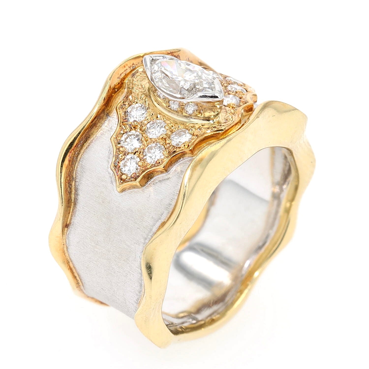 Einzigartiger Ring in 750er Gelbgold und Platin mit insgesamt ca. 0,73 ct Diamanten, stehend