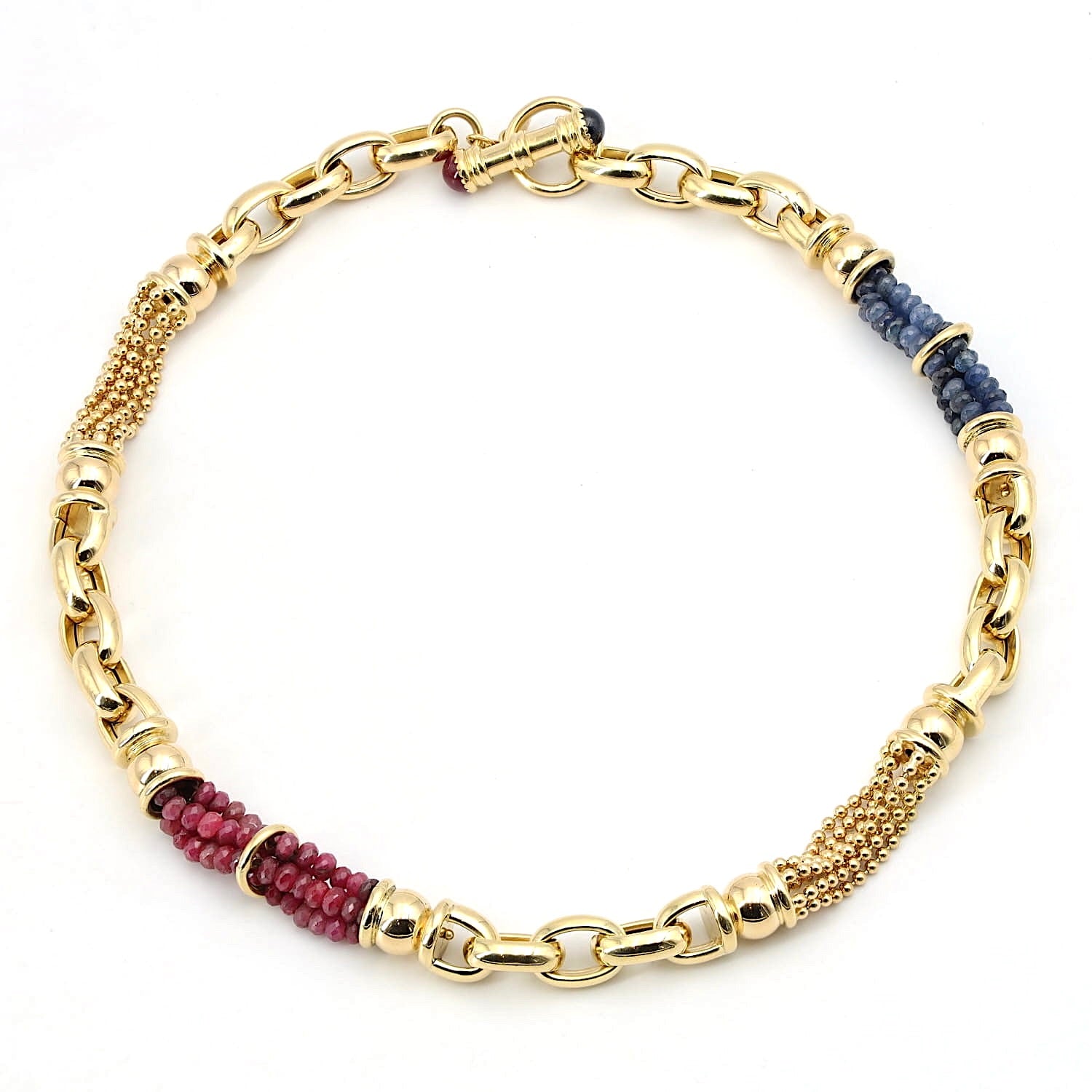 Exclusive italienische Kette in 750er Gelbgold mit Rubinen und blauen Saphiren, liegend geschlossen