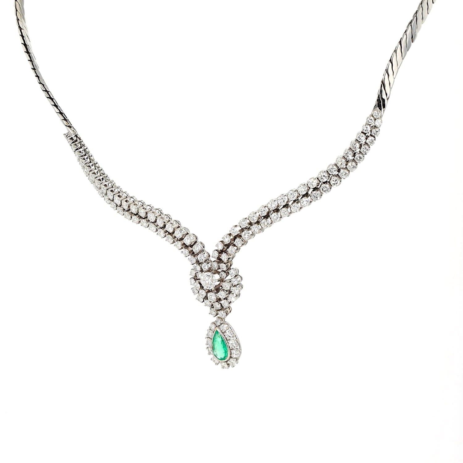 Juwelen-Collier in 750er Weißgold mit ca. 7,0 ct Brillanten und einem Smaragd, hängend links gedreht