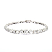 Art Deco Tennisarmband in Platin mit insgesamt ca. 5,1 ct Diamanten im Altschliff, liegend frontal