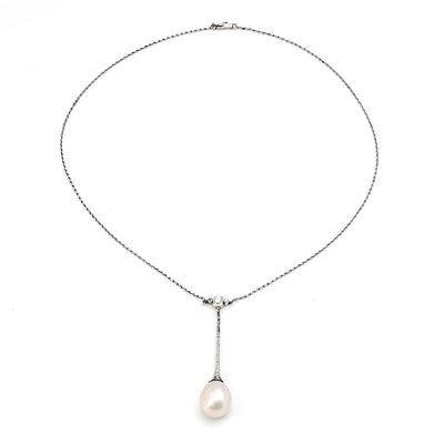 Art Deco necklace in platinum with a large natural pearl and diamonds