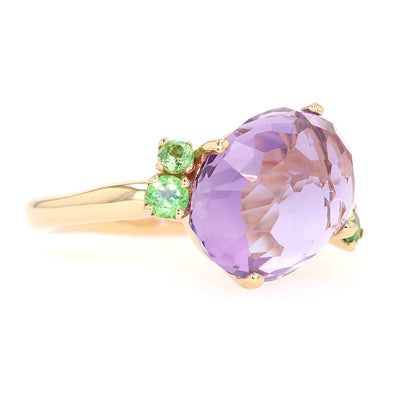 Pomellato ring in 750 rose gold with an amethyst and tsavorite, turned horizontally to the right