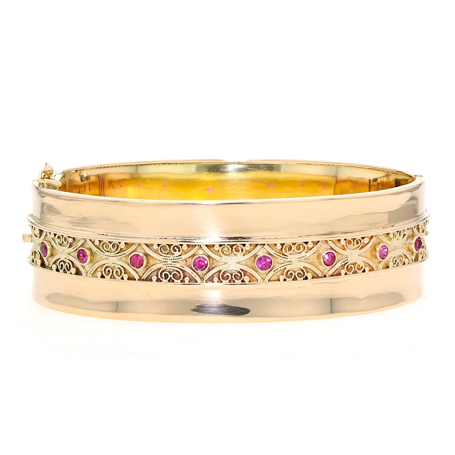 Vintage Armreif in 585er Gelbgold mit Rubinen, liegend frontal