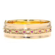 Vintage Armreif in 585er Gelbgold mit Rubinen, liegend frontal