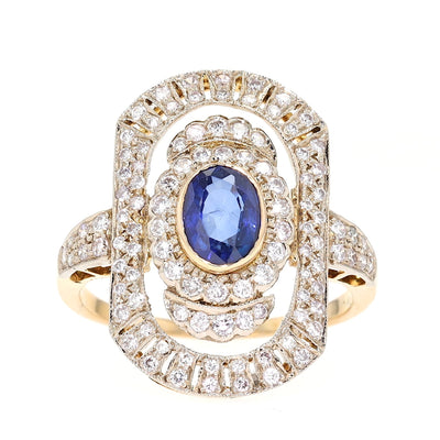 Art-Déco Ring in 750er Gold mit einem blauen Saphir und Brillanten, liegend frontal von vorne
