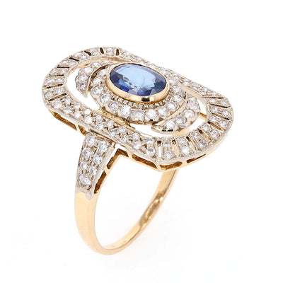 Art-Déco Ring in 750er Gold mit einem blauen Saphir und Brillanten, stehend seitlich gedreht