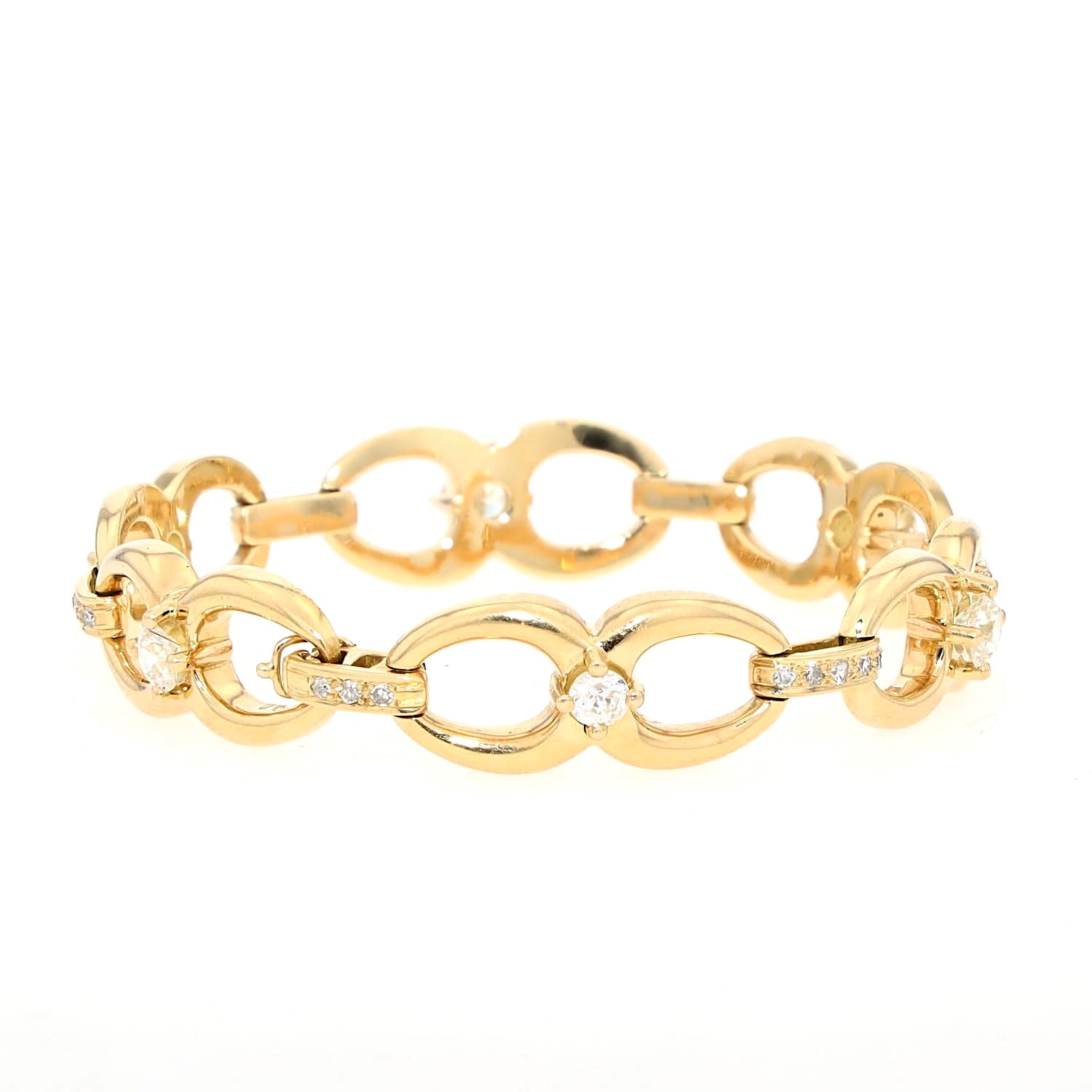 Gliederarmband in 750er Gelbgold mit Diamanten und Brillanten insgesamt ca. 3,5 ct, liegend geschlossen leicht rechts gedreht