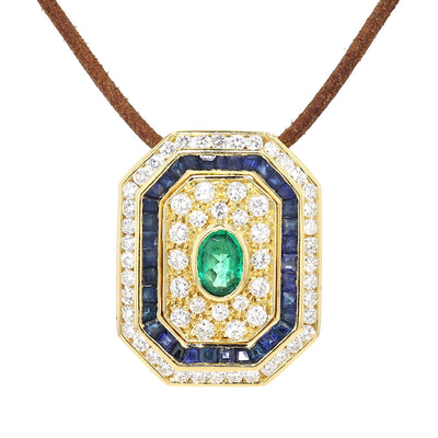 Anhänger in 750er Gelbgold mit Brillanten, blauen Saphiren und einem Smaragd, hängend frontal